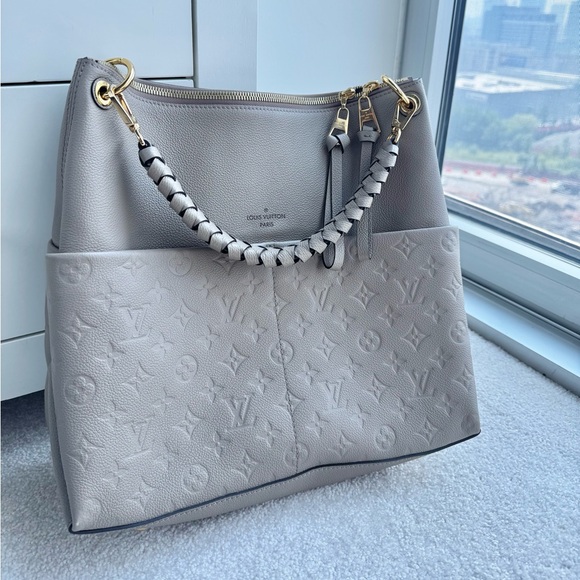 Louis Vuitton Handbags - Louis Vuitton Maida Hobo MM Empreinte Leather in Tourterelle – New with Tags